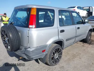 2000 Honda CR-V LX with VIN JHLRD2846YC016747, listed as a IAAI auction lot 41989951 with 163,440 mi miles. Bid and sale history available at carsss.com. Image 4.