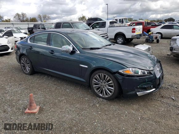 2012 Jaguar XF Portfolio with VIN SAJWA0HB4CLS49225, listed as a Copart auction lot 48070445 with 61,059 mi miles and Salvage Title. Bid and sale history available at carsss.com. Image 4.