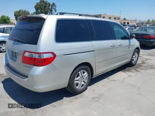 2005 Honda Odyssey EX-L with VIN 5FNRL38725B113815, listed as a IAAI auction lot 42754724 with 179,214 mi miles and . Bid and sale history available at DreamBid. Image 4.