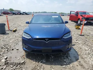 2016 Tesla Model X 70D z VIN 5YJXCAE27GF006668, wystawiony jako Copart lot #59637595 z przebiegiem 58 163 mil mil oraz Czysty tytuł • Clean title. Historia ofert i sprzedaży dostępna na DreamBid. Obrazek 5.