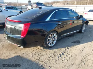 2015 Cadillac XTS Luxury with VIN 2G61N5S34F9226182, listed as a IAAI auction lot 41554394 with 119,194 mi miles. Bid and sale history available at carsss.com. Image 4.