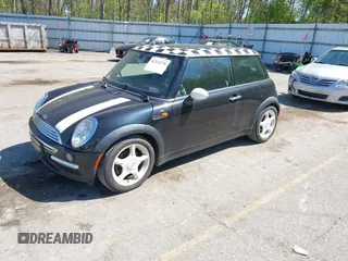 2003 MINI Hardtop with VIN WMWRC33463TC41773, listed as a IAAI auction lot 42223276 with 115,127 mi miles and . Bid and sale history available at DreamBid. Image 2.