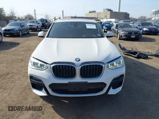 2021 BMW X4 xDrive30i z VIN 5UX2V1C01M9F26524, wystawiony jako IAAI lot #41805153 z przebiegiem 40 353 mil mil oraz . Historia ofert i sprzedaży dostępna na DreamBid. Obrazek 13.