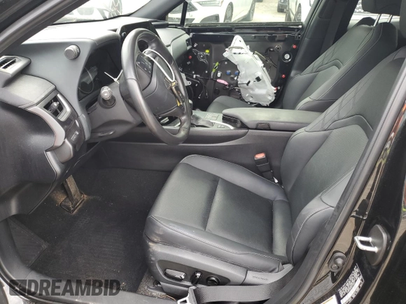 2023 Lexus UX 250h Premium с VIN JTHP6JBH8P2133821, выставлен на аукционе Copart как лот 61007355 с пробегом 32 540 миль миль и Списание • Salvage title. История ставок и продаж доступна на DreamBid. Изображение 7.
