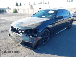 2019 BMW 5 Series M550i xDrive with VIN WBAJB9C51KB288416, listed as a IAAI auction lot 41265378 with 52,529 mi miles and . Bid and sale history available at DreamBid. Image 18.