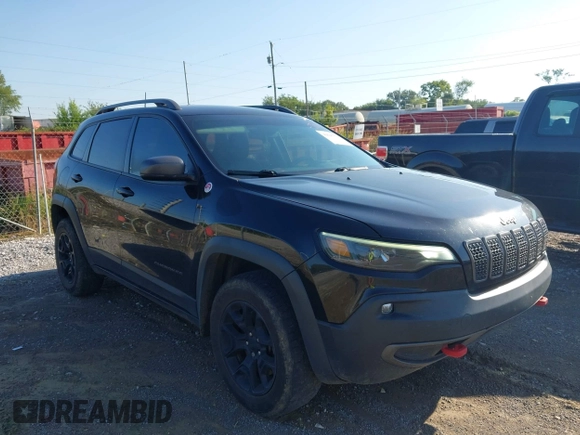 2019 Jeep Cherokee Trailhawk with VIN 1C4PJMBX3KD483895, listed as a IAAI auction lot 42696774 with 122,932 mi miles and . Bid and sale history available at DreamBid. Image 13.