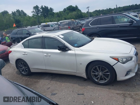 2015 Infiniti Q50 Premium with VIN JN1BV7AR5FM390985, listed as a IAAI auction lot 42641031 with 117,060 mi miles and . Bid and sale history available at DreamBid. Image 13.