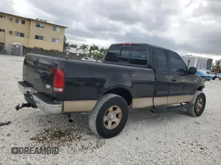 2000 Ford F-150 XL with VIN 1FTZX1721YNC09536, listed as a Copart auction lot 52645405 with 120,638 mi miles and Salvage Title. Bid and sale history available at carsss.com. Image 3.