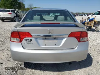 2010 Honda Civic LX with VIN 19XFA1F51AE016877, listed as a Copart auction lot 52275475 with 217,152 mi miles and Salvage Title. Bid and sale history available at DreamBid. Image 6.