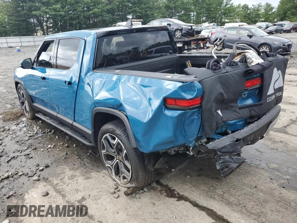 2023 Rivian R1T Adventure with VIN 7FCTGBAA5PN026063, listed as a Copart auction lot 66916194 with Not Provided miles and Salvage Title. Bid and sale history available at DreamBid. Image 2.