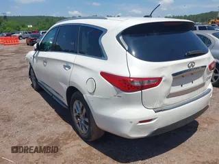 2015 Infiniti QX60 with VIN 5N1AL0MNXFC547099, listed as a IAAI auction lot 42104864 with 128,834 mi miles and . Bid and sale history available at DreamBid. Image 3.