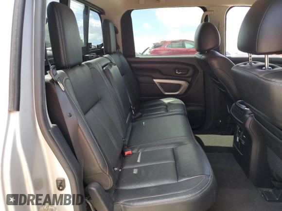2017 Nissan Titan SV z VIN 1N6AA1E68HN500682, wystawiony jako Copart lot #57562415 z przebiegiem 185 539 mil mil oraz Szkoda całkowita • Salvage title. Historia ofert i sprzedaży dostępna na DreamBid. Obrazek 10.