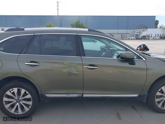 2017 Subaru Outback Touring with VIN 4S4BSETCXH3371887, listed as a IAAI auction lot 41692515 with 57,039 mi miles. Bid and sale history available at carsss.com. Image 13.
