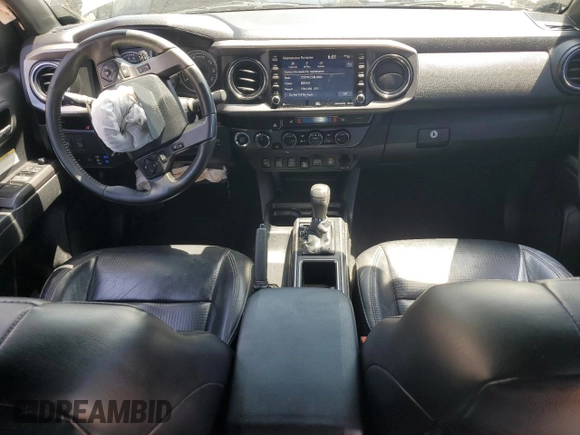 2020 Toyota Tacoma SR5 z VIN 3TMDZ5BN0LM094976, wystawiony jako Copart lot #58695515 z przebiegiem 84 025 mil mil oraz Czysty tytuł • Clean title. Historia ofert i sprzedaży dostępna na DreamBid. Obrazek 8.