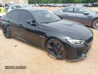 2016 BMW M3 z VIN WBS8M9C52G5D31237, wystawiony jako IAAI lot #42205887 z przebiegiem 106 608 mil mil oraz . Historia ofert i sprzedaży dostępna na DreamBid. Obrazek 1.