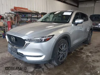 2018 Mazda CX-5 Grand Touring with VIN JM3KFBDM4J0350420, listed as a IAAI auction lot 41881566 with 96,515 mi miles. Bid and sale history available at carsss.com. Image 18.