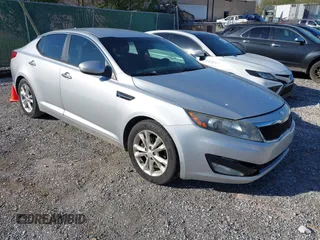 2013 Kia Optima LX with VIN 5XXGM4A79DG199785, listed as a IAAI auction lot 42015820 with 137,202 mi miles. Bid and sale history available at carsss.com. Image 1.