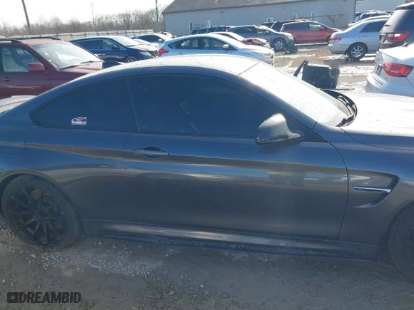 2015 BMW M4 with VIN WBS3R9C57FK334921, listed as a IAAI auction lot 41869773 with 107,058 mi miles. Bid and sale history available at carsss.com. Image 13.