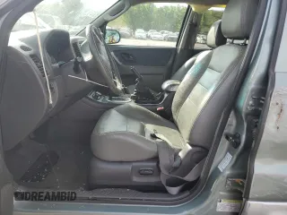 2005 Ford Escape Hybrid z VIN 1FMCU95HX5KE24619, wystawiony jako Copart lot #60624765 z przebiegiem 209 937 mil mil oraz Nie do naprawy • Non repairable. Historia ofert i sprzedaży dostępna na DreamBid. Obrazek 7.