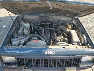 1995 Jeep Cherokee Sport with VIN 1J4FJ67S4SL519629, listed as a Copart auction lot 76107844 with 312,532 mi miles and Salvage Title. Bid and sale history available at carsss.com. Image 12.