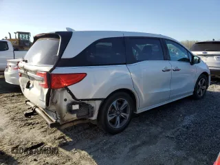 2018 Honda Odyssey Touring с VIN 5FNRL6H8XJB002031, выставлен на аукционе Copart как лот 49996105 с пробегом 202 284 миль миль и Чистый • Clean title. История ставок и продаж доступна на DreamBid. Изображение 3.