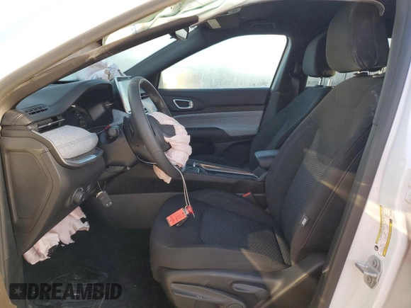2025 Jeep Compass Sport with VIN 3C4NJDAN9ST516030, listed as a Copart auction lot 52292005 with 2,094 mi miles and Salvage title. Bid and sale history available at DreamBid. Image 7.