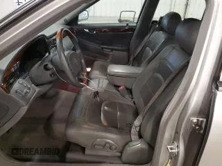 2005 Cadillac DeVille DHS z VIN 1G6KE54Y35U254893, wystawiony jako Copart lot #60356815 z przebiegiem 177 174 mil mil oraz Czysty tytuł • Clean title. Historia ofert i sprzedaży dostępna na DreamBid. Obrazek 7.