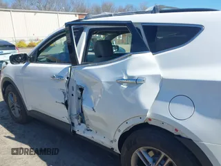 2017 Hyundai Santa Fe 2.4L z VIN 5NMZUDLB9HH028990, wystawiony jako IAAI lot #42055991 z przebiegiem 91 569 mil mil oraz . Historia ofert i sprzedaży dostępna na DreamBid. Obrazek 6.