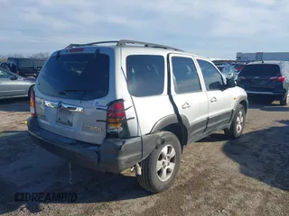 2003 Mazda Tribute LX with VIN 4F2YZ04183KM44733, listed as a IAAI auction lot 41472662 with 246,522 mi miles and . Bid and sale history available at DreamBid. Image 4.