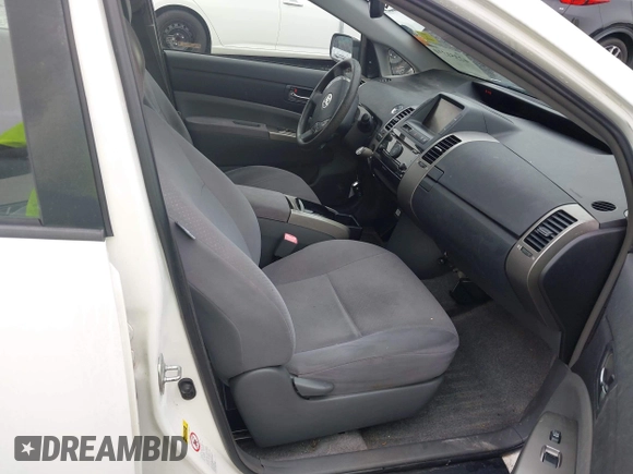 2009 Toyota Prius z VIN JTDKB20U897831736, wystawiony jako IAAI lot #42351310 z przebiegiem 355 571 mil mil oraz . Historia ofert i sprzedaży dostępna na DreamBid. Obrazek 5.