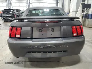 2003 Ford Mustang Deluxe z VIN 1FAFP44433F369534, wystawiony jako Copart lot #76606794 z przebiegiem 88 503 mil mil oraz Szkoda całkowita • Salvage title. Historia ofert i sprzedaży dostępna na DreamBid. Obrazek 6.