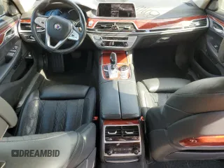 2019 BMW 7 Series with VIN WBA7F2C13KB242430, listed as a Copart auction lot 55525835 with 58,559 mi miles and Salvage title. Bid and sale history available at DreamBid. Image 8.