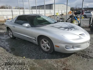 2002 Pontiac Firebird with VIN 2G2FS22K122146573, listed as a Copart auction lot 84674224 with 156,932 mi miles and Salvage Title. Bid and sale history available at carsss.com. Image 4.