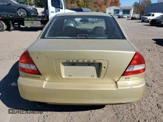 1997 Mitsubishi Mirage z VIN JA3AY36A9VU027615, wystawiony jako Copart lot #77401214 z przebiegiem 104 407 mil mil oraz Szkoda całkowita • Salvage title. Historia ofert i sprzedaży dostępna na DreamBid. Obrazek 6.