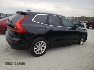 2018 Volvo XC60 Momentum with VIN LYV102RK1JB073418, listed as a Copart auction lot 73763614 with 64,692 mi miles and Salvage Title. Bid and sale history available at DreamBid. Image 3.
