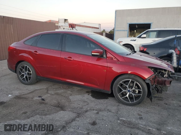 2017 Ford Focus SEL with VIN 1FADP3H2XHL258305, listed as a Copart auction lot 43835715 with 82,419 mi miles and Salvage Title. Bid and sale history available at carsss.com. Image 4.