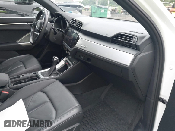 2020 Audi Q3 S line Premium with VIN WA1DECF30L1115390, listed as a IAAI auction lot 42503728 with 18,556 mi miles and . Bid and sale history available at DreamBid. Image 5.