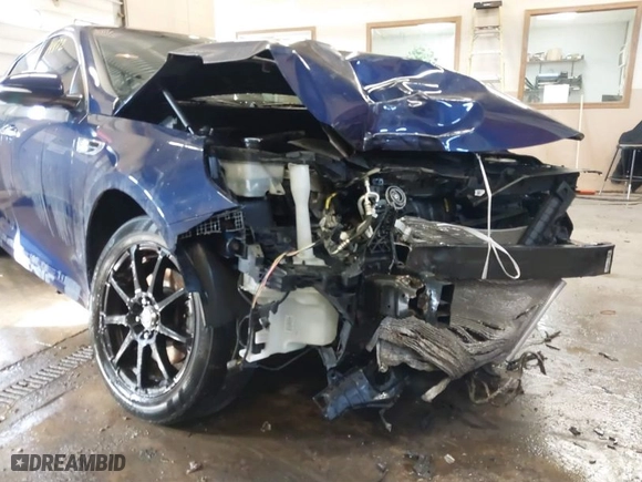 2016 Kia Optima LX with VIN 5XXGT4L33GG026572, listed as a IAAI auction lot 41514872 with 135,423 mi miles. Bid and sale history available at carsss.com. Image 6.