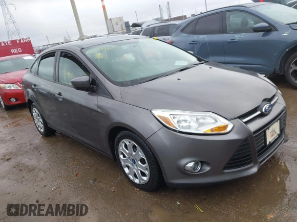 2012 Ford Focus SE with VIN 1FAHP3F26CL220986, listed as a IAAI auction lot 41719127 with 127,050 mi miles and . Bid and sale history available at DreamBid. Image 1.