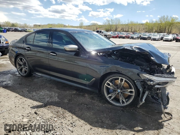 2018 BMW 5 Series M550i xDrive with VIN WBAJB9C55JB049384, listed as a Copart auction lot 54934435 with 79,061 mi miles and Non Repairable. Bid and sale history available at DreamBid. Image 4.