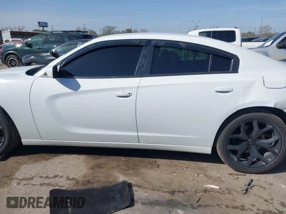 2015 Dodge Charger SXT with VIN 2C3CDXHG8FH725446, listed as a IAAI auction lot 41742400 with 84,579 mi miles and . Bid and sale history available at DreamBid. Image 14.