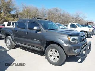 2014 Toyota Tacoma PreRunner with VIN 5TFJU4GN3EX057731, listed as a IAAI auction lot 41703750 with 110,321 mi miles. Bid and sale history available at carsss.com. Image 13.