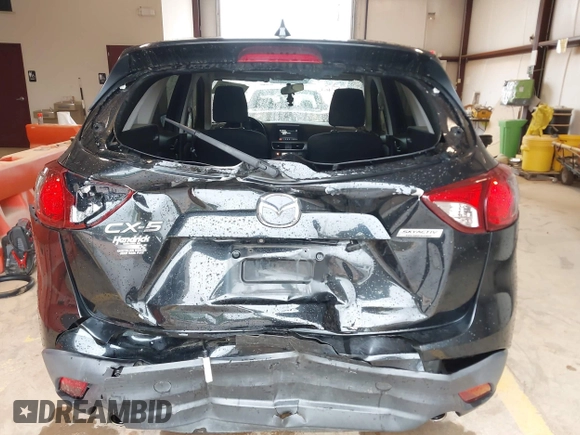 2016 Mazda CX-5 Touring with VIN JM3KE2CY7G0867355, listed as a IAAI auction lot 41963169 with 117,727 mi miles and . Bid and sale history available at DreamBid. Image 16.