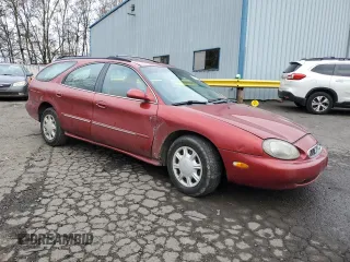 1998 Mercury Sable LS z VIN 1MEFM55U2WA603086, wystawiony jako Copart lot #88533205 z przebiegiem 151 086 mil mil oraz Szkoda całkowita • Salvage title. Historia ofert i sprzedaży dostępna na DreamBid. Obrazek 4.