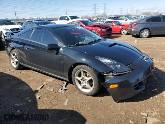 2000 Toyota Celica GTS with VIN JTDDY32T2Y0007501, listed as a Copart auction lot 51665445 with 195,920 mi miles and Salvage Title. Bid and sale history available at DreamBid. Image 4.