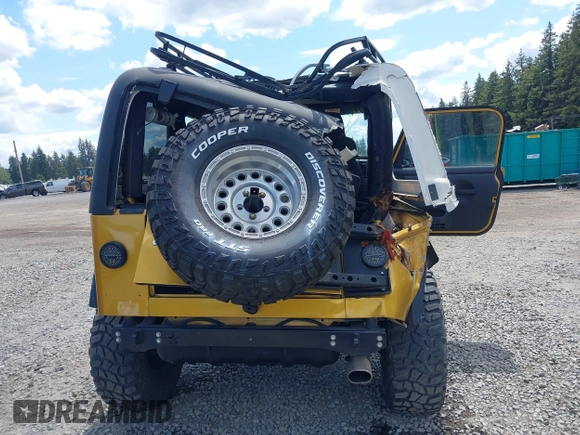 2003 Jeep Wrangler Rubicon with VIN 1J4FA69S93P302102, listed as a IAAI auction lot 42312951 with 146,408 mi miles and . Bid and sale history available at DreamBid. Image 16.