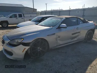 2012 BMW 6 Series 650i z VIN WBALZ3C54CDL72480, wystawiony jako Copart lot #82797714 z przebiegiem 114 154 mil mil oraz Tytuł czysty. Historia ofert i sprzedaży dostępna na DreamBid. Obrazek 1.