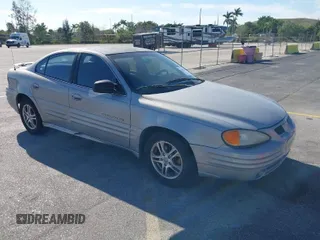 2000 Pontiac Grand Am SE with VIN 1G2NE52T8YM712695, listed as a IAAI auction lot 41855853 with 63,914 mi miles. Bid and sale history available at carsss.com. Image 1.