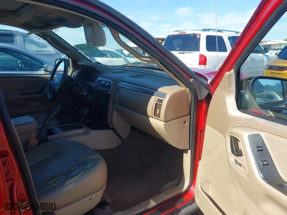 2004 Jeep Grand Cherokee Laredo with VIN 1J4GX48S64C401347, listed as a IAAI auction lot 41491111 with 189,436 mi miles. Bid and sale history available at carsss.com. Image 5.