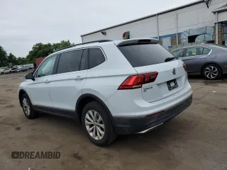 2018 Volkswagen Tiguan SEL with VIN 3VV2B7AX3JM185619, listed as a Copart auction lot 59421195 with 164,431 mi miles and Salvage title. Bid and sale history available at DreamBid. Image 2.
